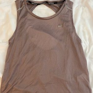 Nike running tank top with open back.